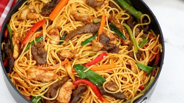 Spaghetti Jollof with Mixed Proteins